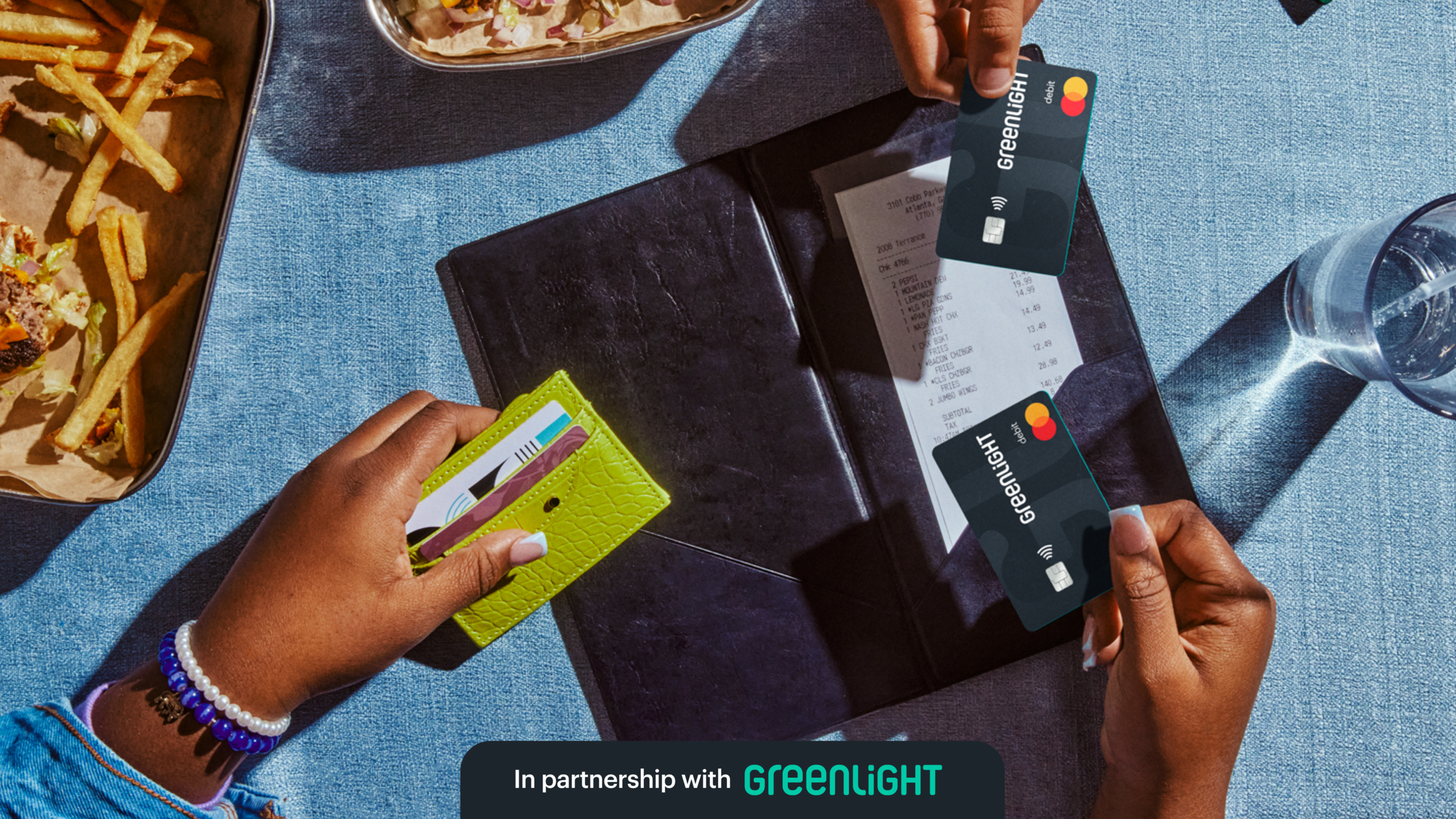 Greenlight cards and a phone