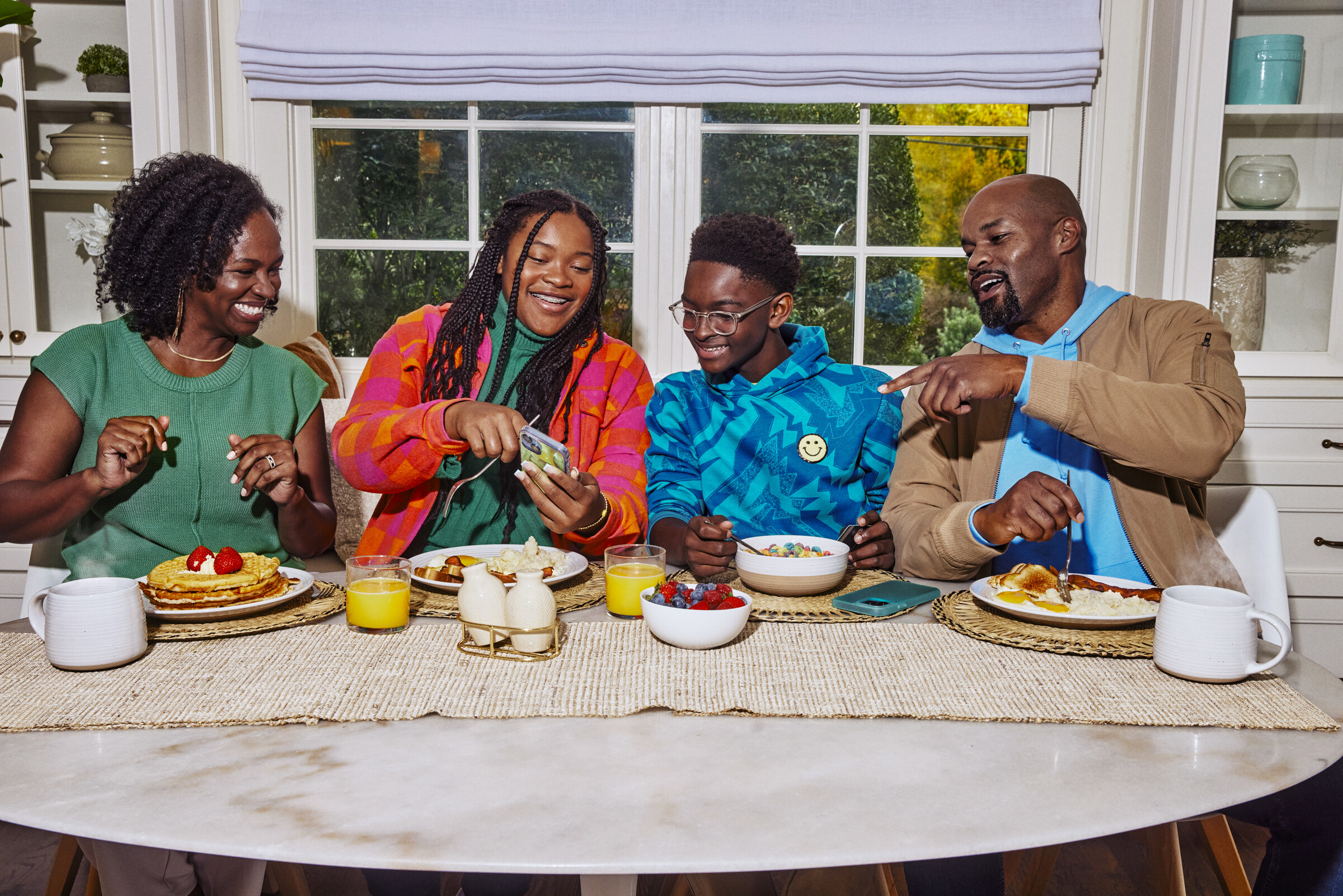 Family sharing a meal and learning together